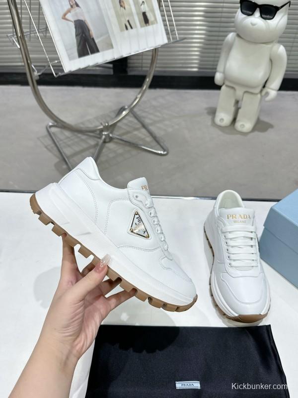 2025 Women Prada White Cow Leather Lambskin Sneakers KFY00310